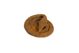 Handmade African iron coiled snake sculpture with rustic, reddish-brown patina.