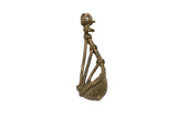 Collectable vintage African bronze musical instrument pendant with dark, aged patina.