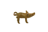 Vintage African oxidized bronze boar pendant with a textured, handmade finish.