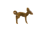 Vintage African bronze ewe pendant with a rustic, handmade texture and warm patina.