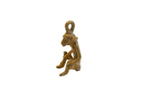 Collectible vintage African bronze sitting monkey pendant, handmade with an aged patina. Measures 1.5 inches.