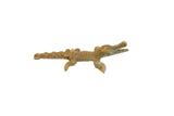 Vintage African handmade crocodile sculpture featuring a dark bronze patina. 4.5 inches long.
