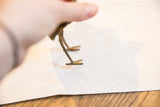 Detail of the slender bronze legs and feet of the vintage African ostrich figure.