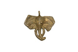 Vintage African elephant head pendant with a weathered brass finish and charming handmade details.