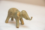 Handmade African bronze elephant, mesh design body with aged patina.