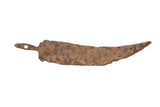 Vintage African handmade iron chili pepper with a rustic, heavily rusted patina.