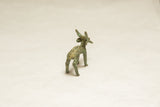Handmade vintage African impala sculpture from rear showing green-brown patina.
