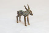 Handmade African bronze impala head with distinct horns and time-softened patina.