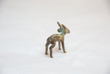 Textured dark bronze African impala sculpture with green patina from the rear quarter view.