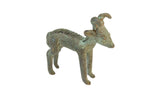 Vintage African bronze ram sculpture with a green oxidized patina and forward-curving horns.
