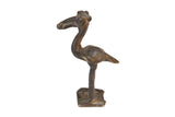 Vintage African handmade crowned bird sculpture with a dark aged patina.
