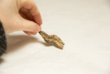 Aged texture and handmade details on the vintage double headed snake pendant.