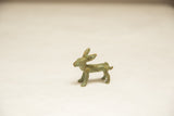 Side view of the vintage African bronze hare showing its textured, oxidized surface.