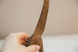 Vintage African bronze giraffe neck, showing intricate etched patterns and light patina.
