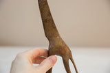Vintage African bronze giraffe's body with intricate etched patterns and light patina.