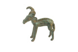 Vintage African bronze ram sculpture with a forward horn, leaf detail, and weathered green patina.