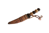 Vintage African dagger with a hand-carved cheetah pattern wooden handle and a wrapped leather sheath.