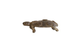Vintage handmade African turtle in dark bronze with an imperfect circle-back shell.
