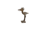 A vintage African bronze stork sculpture with a crowned head, open beak, and textured patina.