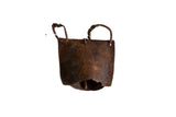 Vintage African iron cow bell with rustic brown patina and handmade texture, 4x4x2 inches.