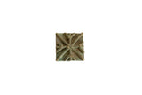 Handmade African square oxidized bronze coin with a raised geometric starburst pattern.
