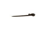 Vintage African bronze pin featuring a hand-cast chameleon figure with a dark, rustic patina.