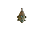 Vintage African mask pendant in oxidized bronze with a rich, textured green patina.