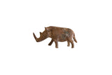 Vintage African medium copper alloy thin-nosed rhino sculpture with an aged rustic patina, 3.5 inches.