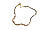 Vintage handmade African flour bead necklace with striped earthy and blue tones.