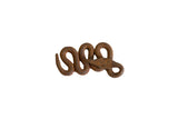 Vintage African iron snake sculpture coiled with a textured, rusted patina.
