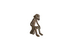 Vintage African bronze monkey sculpture, handmade with a rich, aged patina. 2 inches.