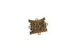 Vintage African bronze shield ring with cast braided textures and a warm patina.