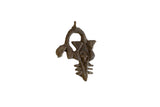Vintage African bronze sea creature pendant with a rustic, handmade abstract form.
