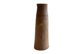 Handmade antique African tall wooden vase, showing warm brown wood grain and aged patina.
