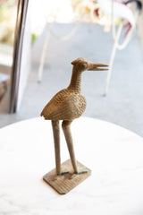 Vintage African bronze stork head, textured neck, carved eye, and aged patina.