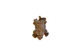 Vintage African copper turtle pendant featuring a handmade, grid-patterned shell.