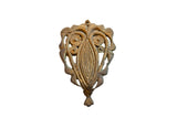 Handmade African bronze owl medallion with abstract details and a warm gold patina.