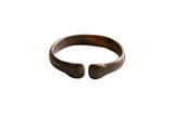 Antique African bronze snake cuff bracelet with a rustic, time-softened patina.