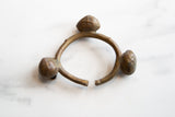 Collectible Lobi bell cuff bracelet with a handmade form and aged bronze patina.