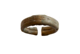 Antique African bronze alloy cuff bracelet with an incised stripe design and aged patina.