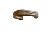 Antique African bronze cuff bracelet with a detailed braided texture and aged patina.