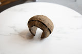 Angled profile of the antique copper cuff showing its oxidized, hand-textured surface.