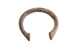 Collectible mid-19th century African copper alloy manilla cuff bracelet with patina.