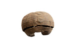 Antique African metal cuff bracelet with a wide, textured band and raised geometric details.