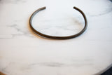 Intricate, geometric detailing etched by hand onto the vintage bronze artifact.