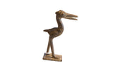 Handmade vintage African dark bronze stork sculpture with an aged, textured patina.
