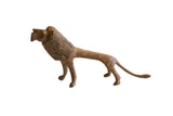 Vintage African bronze alloy lion sculpture, mid-century with rich patina and textured mane.