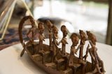 Handmade African bronze passenger figures, individual expressions and rich patina.