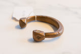 Aged copper and bronze snake cuff bracelet with unique handcrafted patina.