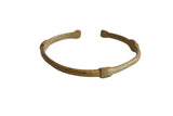 Vintage African bronze cuff bracelet with a handmade, imperfect form and a naturally aged patina.